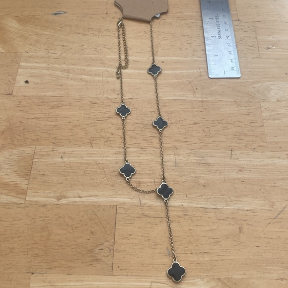 Good tone and black double side y - necklace. Necklace is 18 in w 3 in extender - Picture 6 of 6